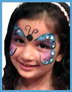 Birthday child gets facepainted as butterfly with her favorite colors in Queens nyc