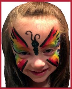 Rainbow butterfly face painting is popular at kids birthday parties in New York City