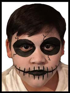 Skeleton facepaint is requested by boy at birthday party Manhattan NY