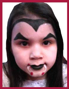 Older girl wanted vampire face painting at Halloween party Brooklyn NYC