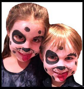 Kids look cute with matching dalmation facepainting at birthday party in NYC
