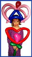 Girls balloon hat at a childrens birthday party in nyc