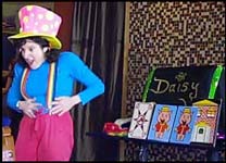 Daisy Doodle performing clown magic for kids party entertainment in nyc.