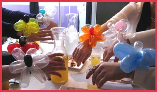 Balloon twisting bracelets for ladies at birthday party brunch in New York City