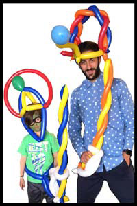 Balloon animals twister Daisy Doodle made uncle and nephew matching outfits at birthday party in Manhattan nyc