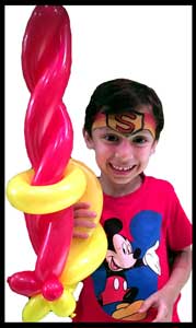 Sword balloon twisting and superman face paint for boy at kids night in Bronx NYC