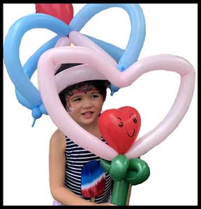 Daisy Doodle twists balloons for birthday party entertainment in Westchester NY