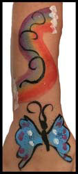 Rainbow and butterfly body painting for kids party entertainment in Queens NYC