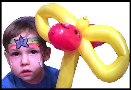 Kid picked rainbow facepaint, plus balloon twisted bumblebee for his birthday party in Westchester NY