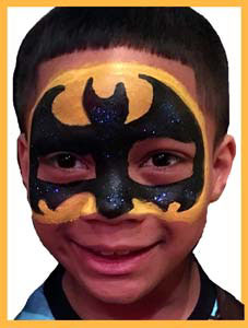 Kid chose superhero Batman face painting at his birthday party Bronx NYC