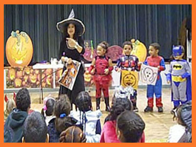 Children decorate table for Daisy Doodle's Halloween magic show NY NJ CT