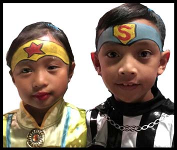 These kids get facepainted as superheros at halloween party in Queens NY