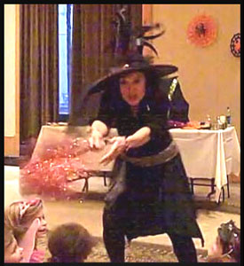 Daisy Doodle Diabolica's dramatic opening number for her halloween kids party magic show in nyc