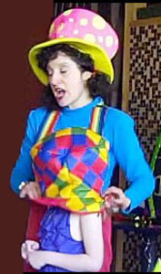 Kids magician Daisy Doodle performing comedy clown magic show with birthday girl in Long Island NY