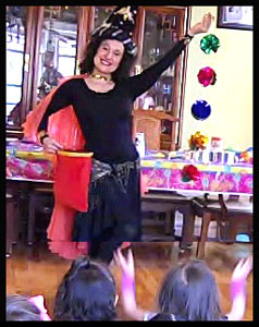 More wizard magic from wizard magician Daisy Doodle pulling out tinsel balls from empty bag in Long Island NY